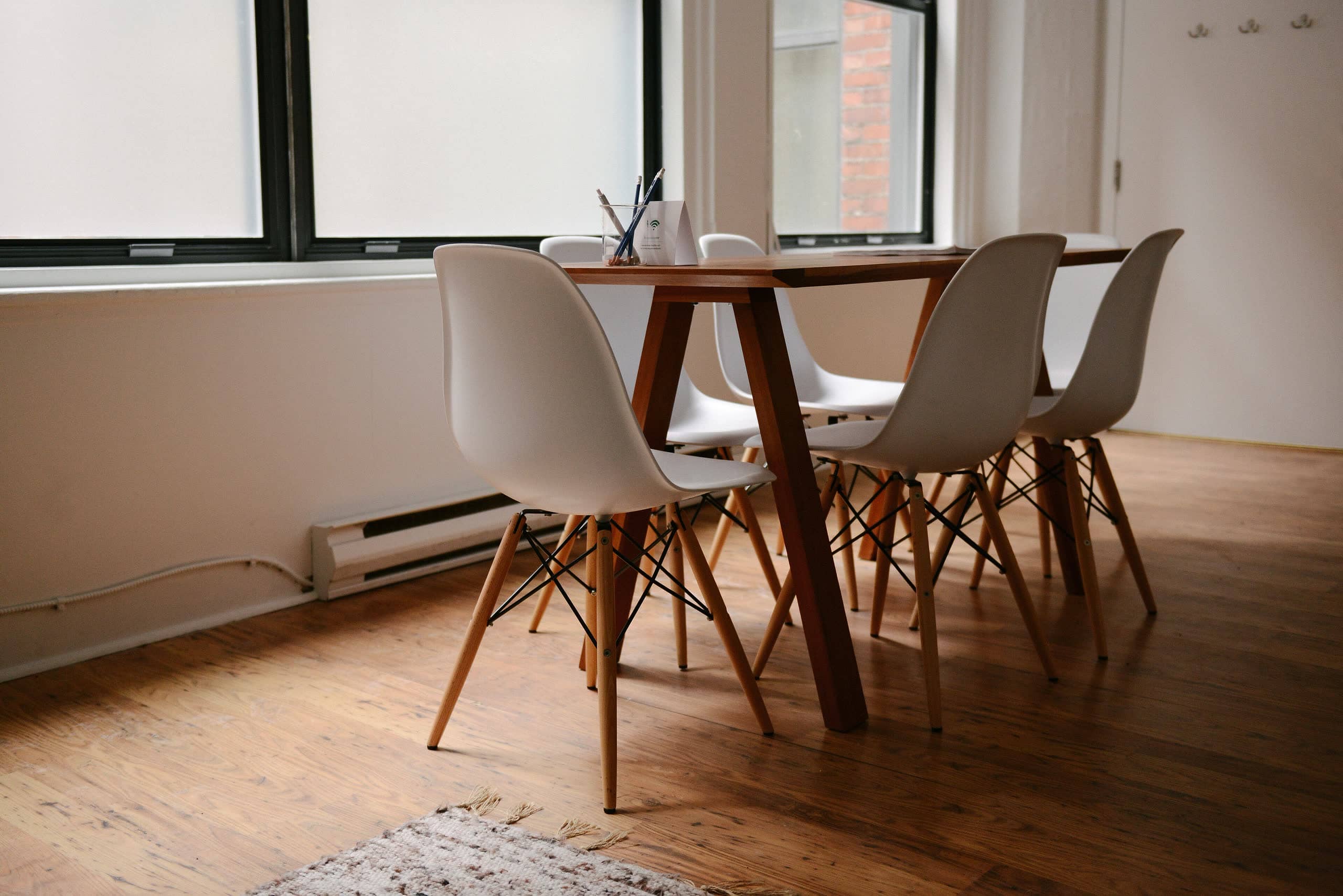 Chairs around a meeting table